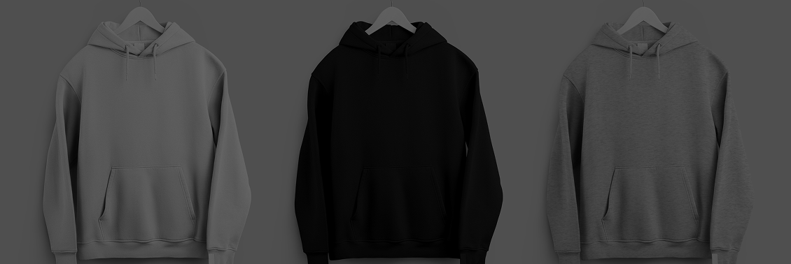 Neutral-toned hoodies displayed on hangers.