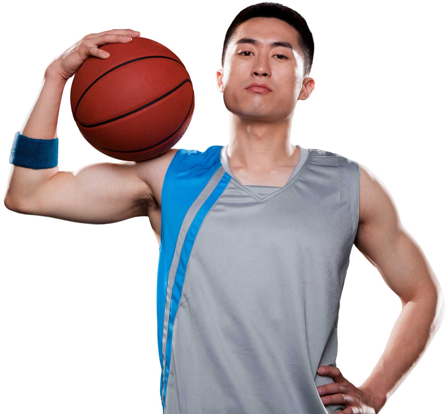 Athlete holding basketball confidently